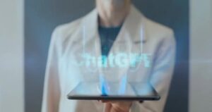 Professional in a light blazer presents a tablet with a glowing holographic word 'Watch' projected above it.