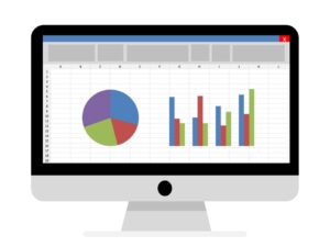 Desktop monitor showing a spreadsheet with a left pie chart and right bar charts for data visualization.